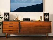 Marantz MCR 60n compact hi-fi system centred on a mid-century modern credenza flanked by two bookshelf speakers below a wall-mounted TV
