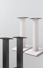 Set of three KEF Dedicated Stand for Q Series in black and white on a light gray background