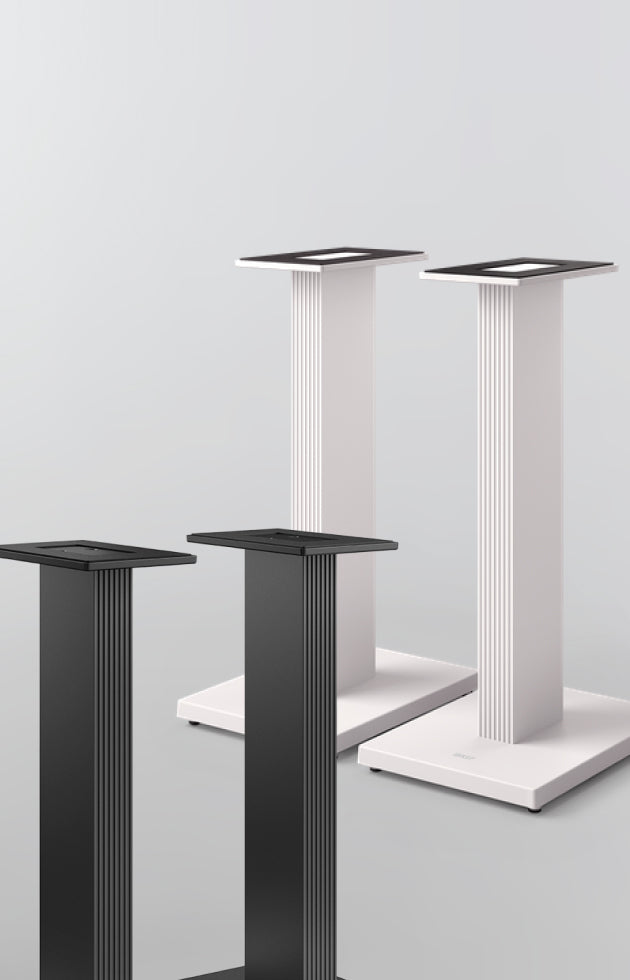 Set of three KEF Dedicated Stand for Q Series in black and white on a light gray background