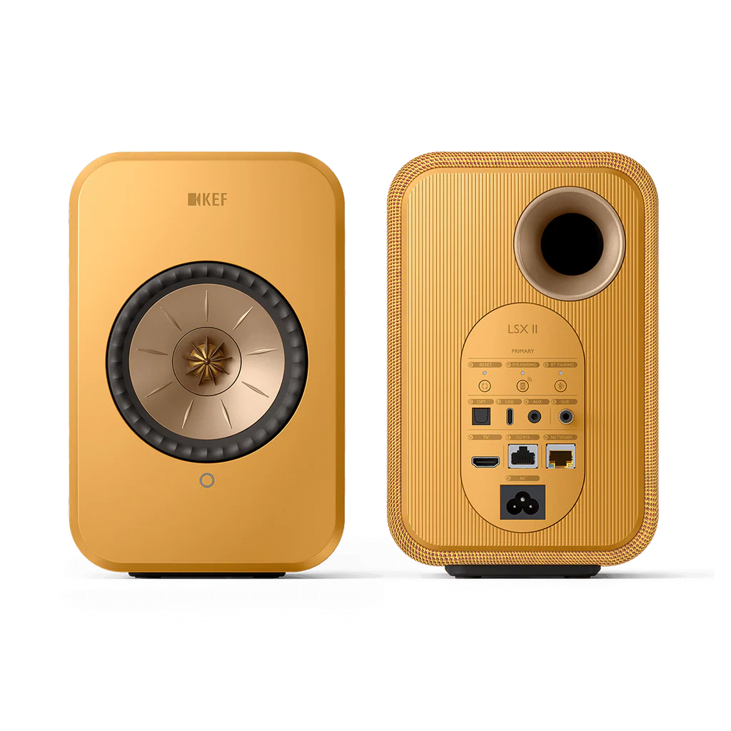 Yellow KEF LSX II speakers on a white background