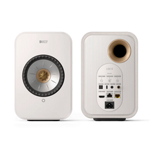 Cotton white KEF LSX II speakers on a white background