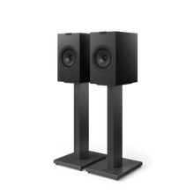 Pair of black speakers on KEF Dedicated Stand for Q Series against a white background