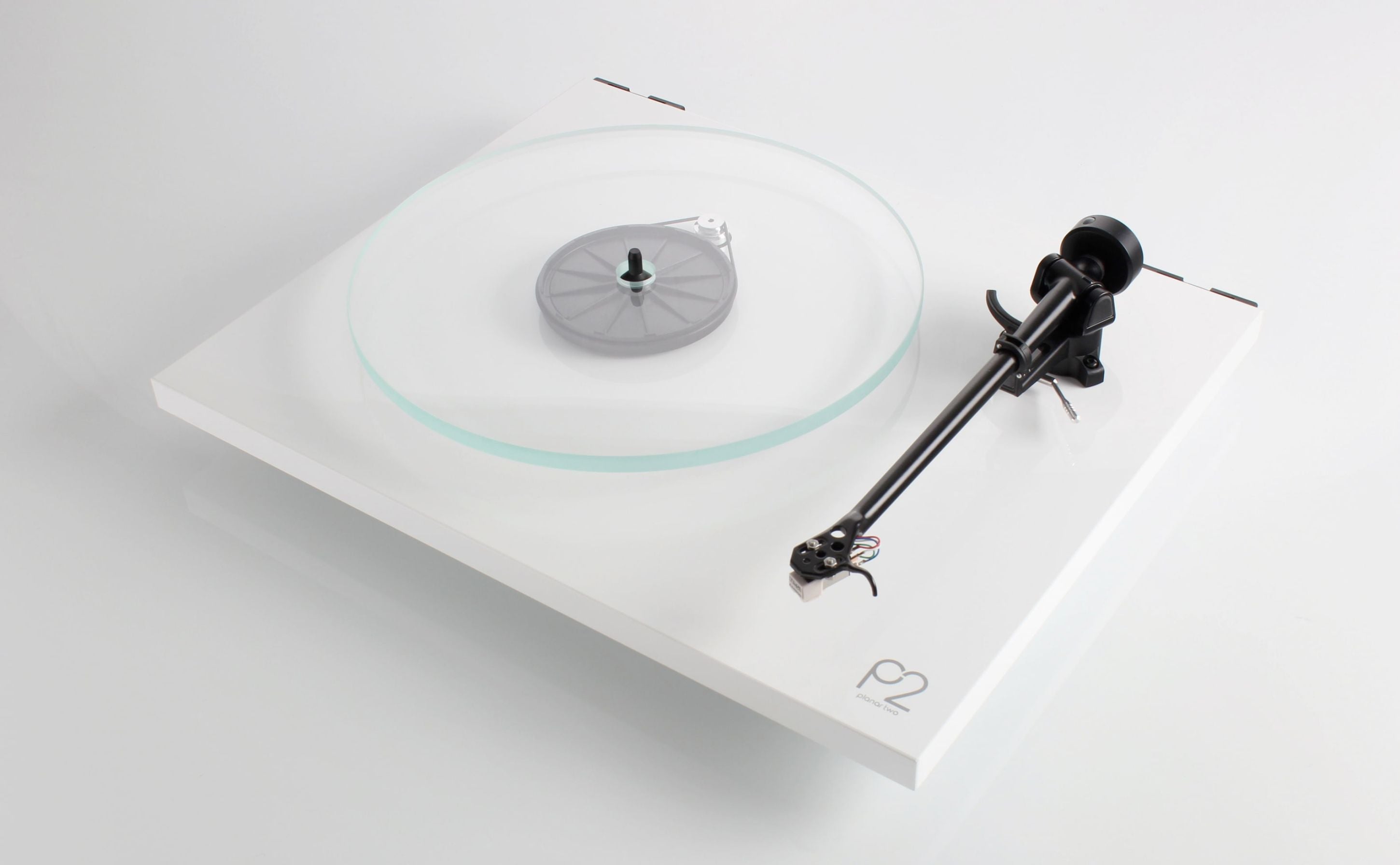 White Rega Planar 2 With Nd3 Cartridge with a clear platter on a white background
