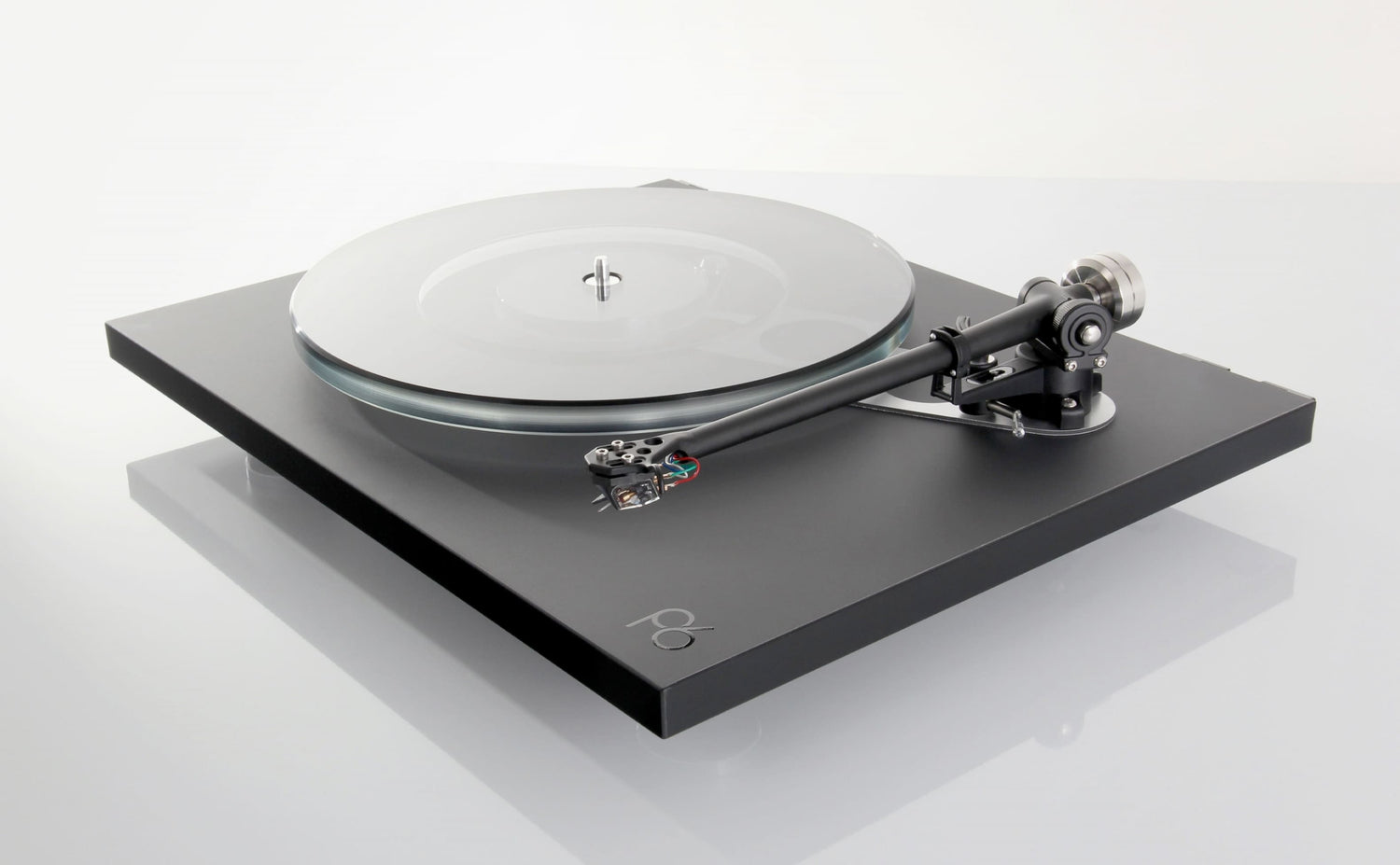 Black Rega Planar 6 turntable with glass platter and tonearm, no cartridge included.