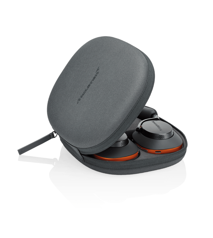 Bowers & Wilkins PX8 McLaren Edition Wireless Headphones, featuring Galvanic grey leather with Papaya orange details in a carrying case.