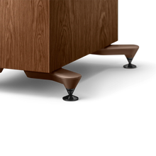 A closeup of legs of KEF R7 Meta Floor Standing Speaker in walnut color.