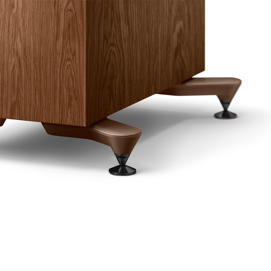 A closeup of legs of KEF R7 Meta Floor Standing Speaker in walnut color.