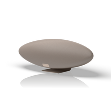 A side view of a Bowers & Wilkins Zeppelin Pro Wireless Speaker in solar gold on a white background - Hi-Fi Centre.