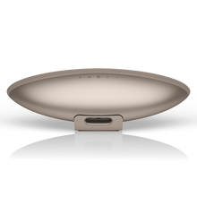 Bottom view of a Bowers & Wilkins Zeppelin Pro Wireless Speaker in solar gold on a white background - Hi-Fi Centre.