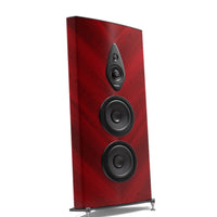 Floor-standing Sonus Faber speaker in glossy red wood finish with three black drivers and metal feet.